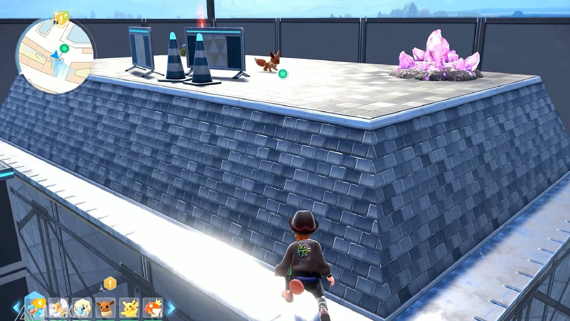 Eevee is located on top of a building in Bleu Sector 7 in the early game of Pokemon Legends Z-A (Image via The Pokemon Company || YouTube@Arekkz Gaming)