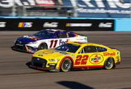Joey Logano (22) and Denny Hamlin (11) during the 2023 Championship Race at Phoenix. Source: Imagn