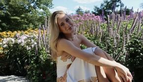 NASCAR style icon Erin Blaney makes a fashion statement in a blue bridesmaid dress