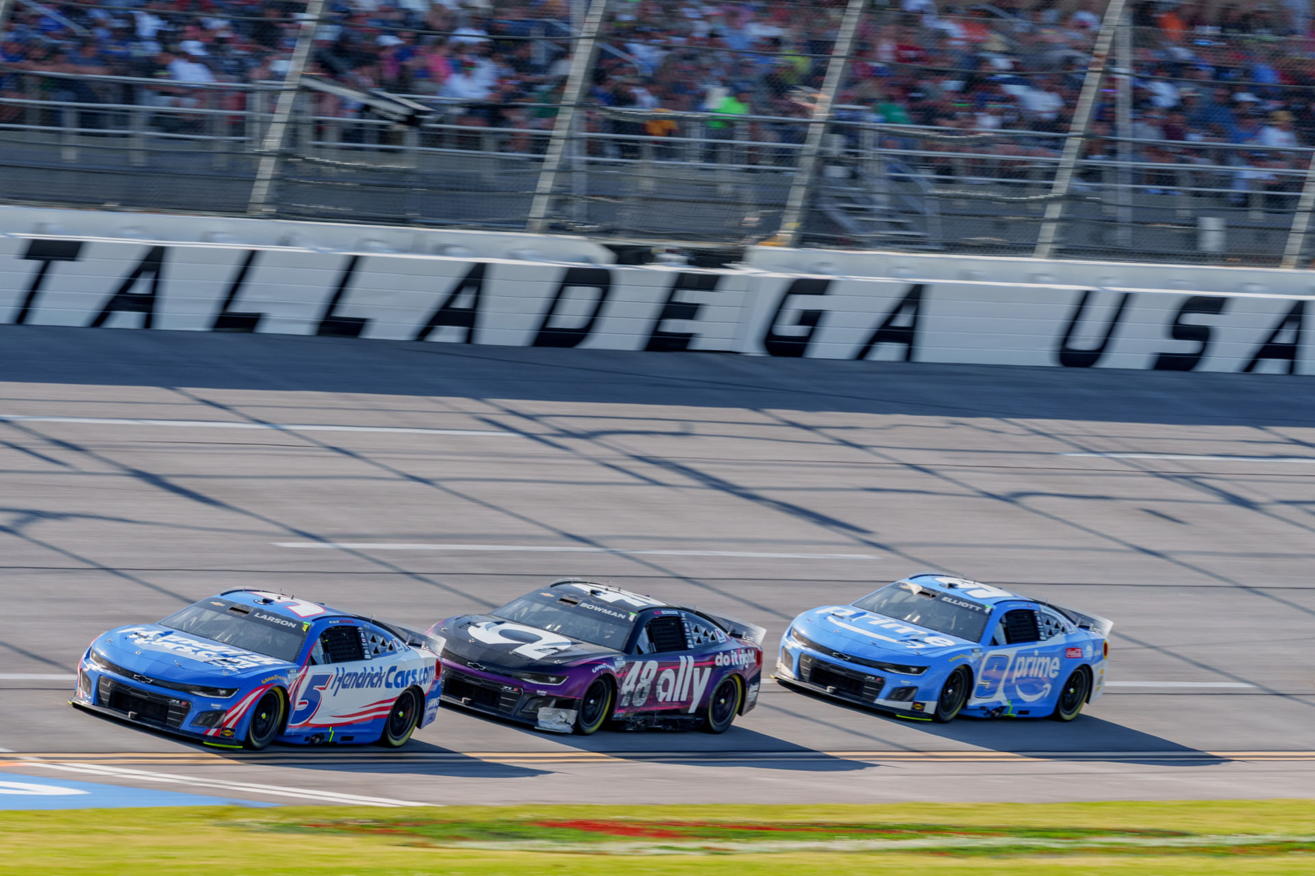 Kyle Larson (5), Alex Bowman (48), and Chase Elliott (9) at Talladega. Source: Imagn