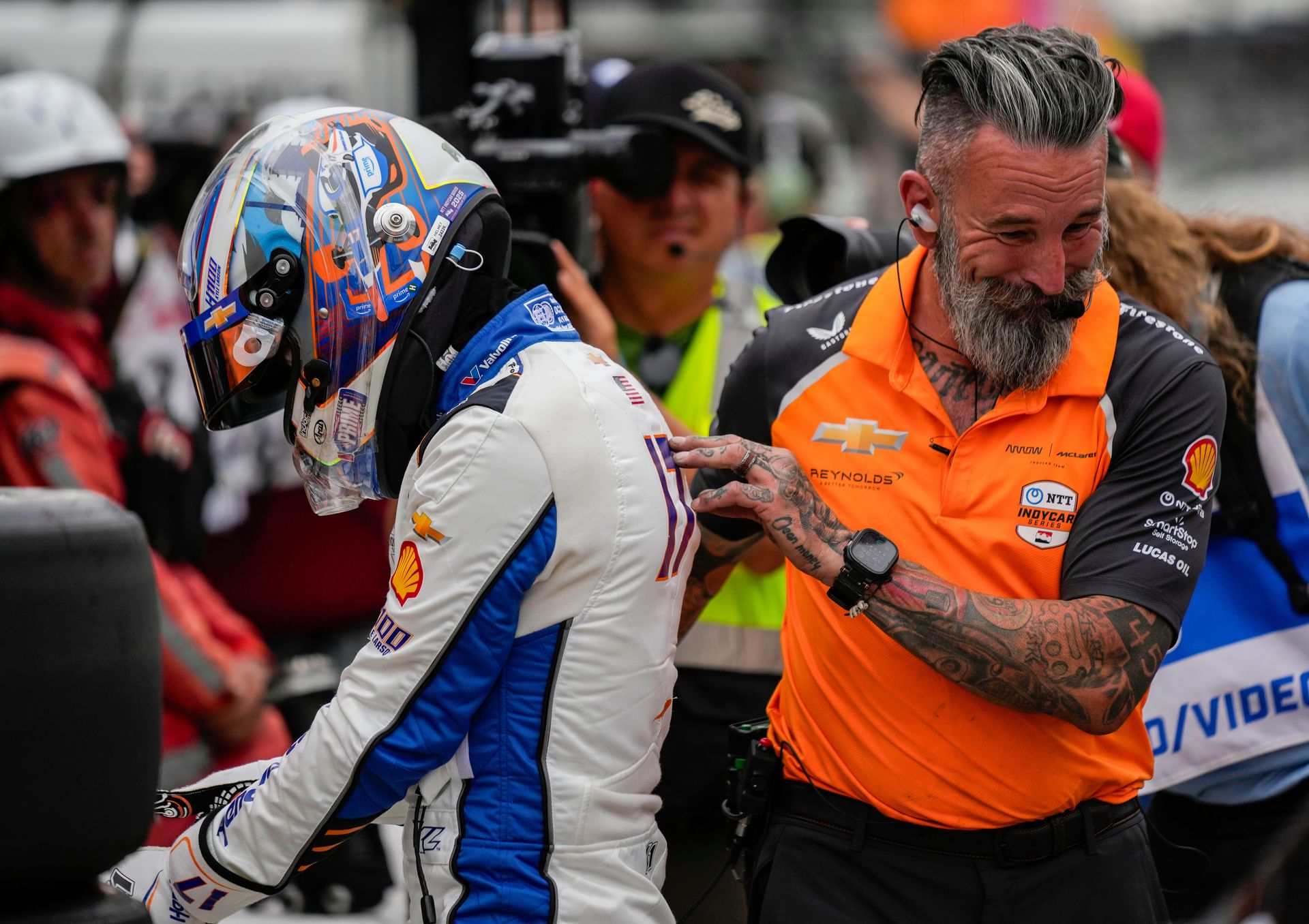 Kyle Larson jumping out of his car at the practice of the 109th running of the Indianapolis 500 - Source: Imagn