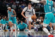 Dallas Mavericks forward Cooper Flagg (32) dribbles up court against the Charlotte Hornets in the second half of a game at American Airlines Center. Mandatory Credit: Raymond Carlin III-Imagn Images