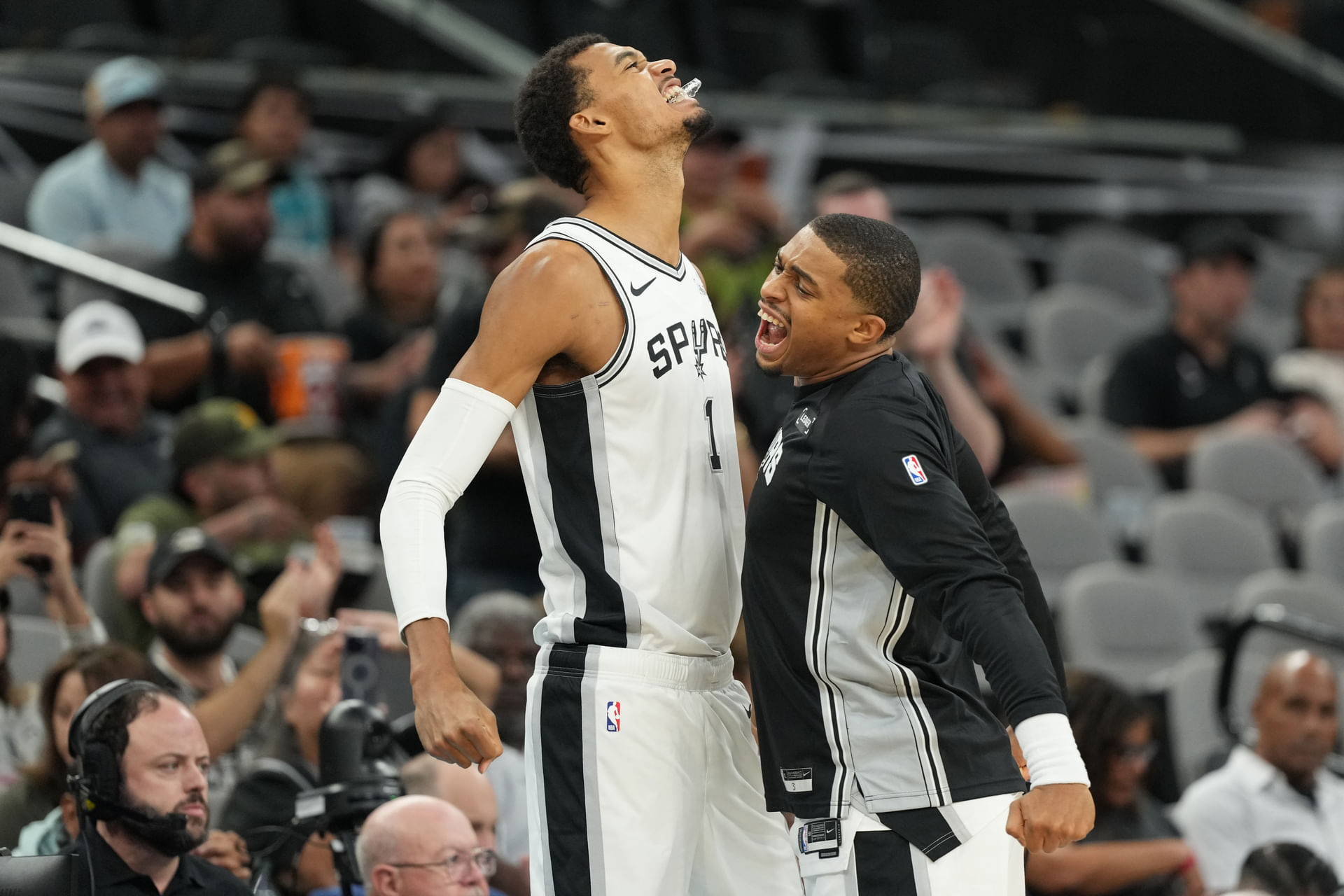 San Antonio Spurs forward Victor Wembanyama (1) forward Keldon Johnson (3) hits his chest before the game against the Indiana Pacers at Frost Bank Center. Mandatory credit: Scott Wachter-Images Images