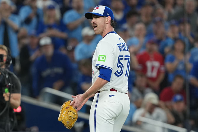 Shane Bieber’s wife Kara turns heads in chic leather jacket featuring painting of Blue Jays' ace at World Series Game 1 vs. Dodgers