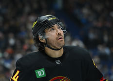 "That's 100% Kiefer Sherwood": NHL fans react to mystery Canucks player hurling injury threat at Canadiens bench