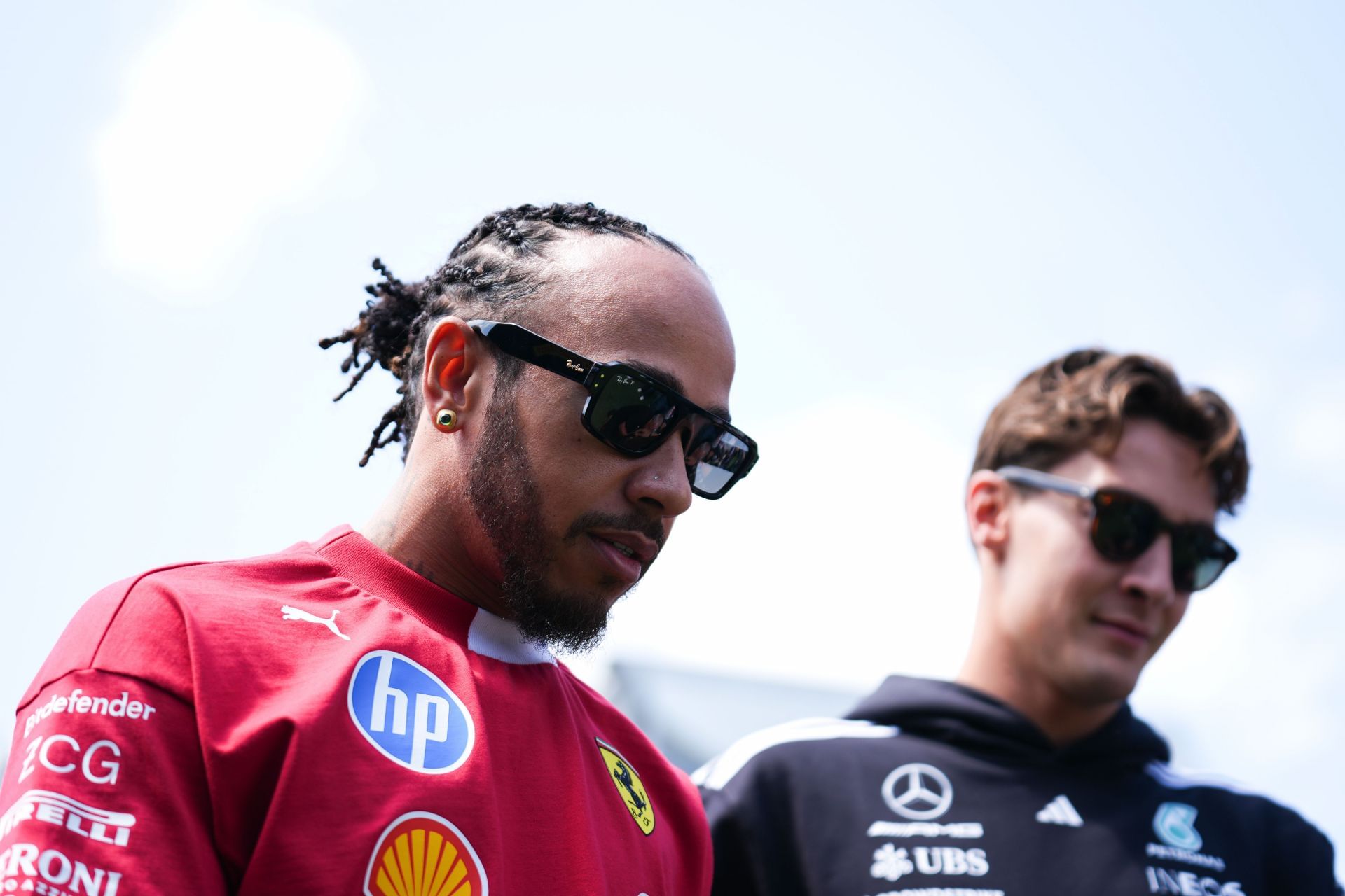 Ferrari&#039;s Lewis Hamilton (L) and Mercedes&#039; George Russell ahead of the FP3 for the 2025 F1 Grand Prix of Canada - Source: Getty
