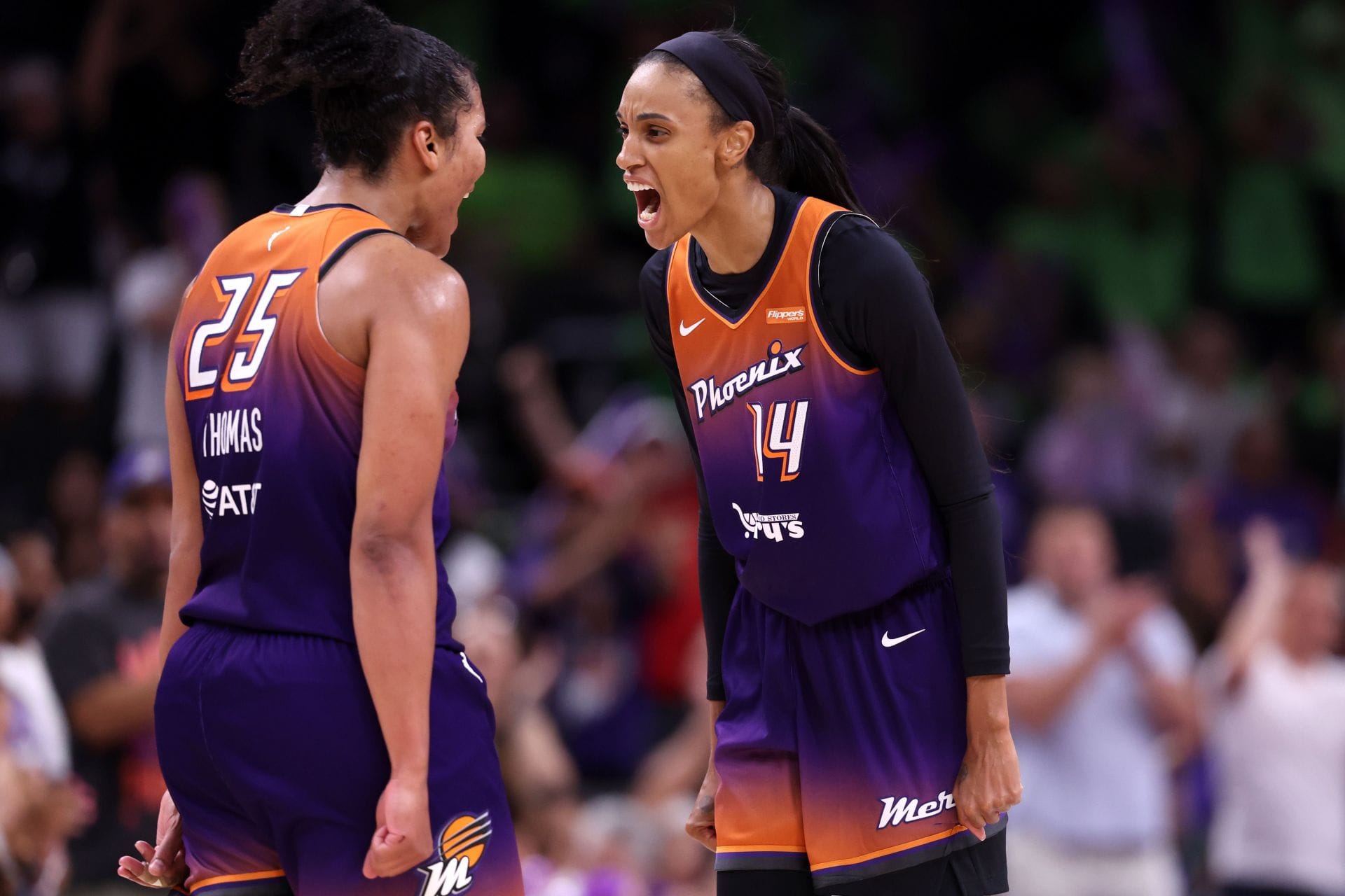 Alyssa Thomas #25 celebrates with DeWanna Bonner #14 of the Phoenix Mercury after scoring a basket during the second half against the Minnesota Lynx at PHX Arena - Source: Getty