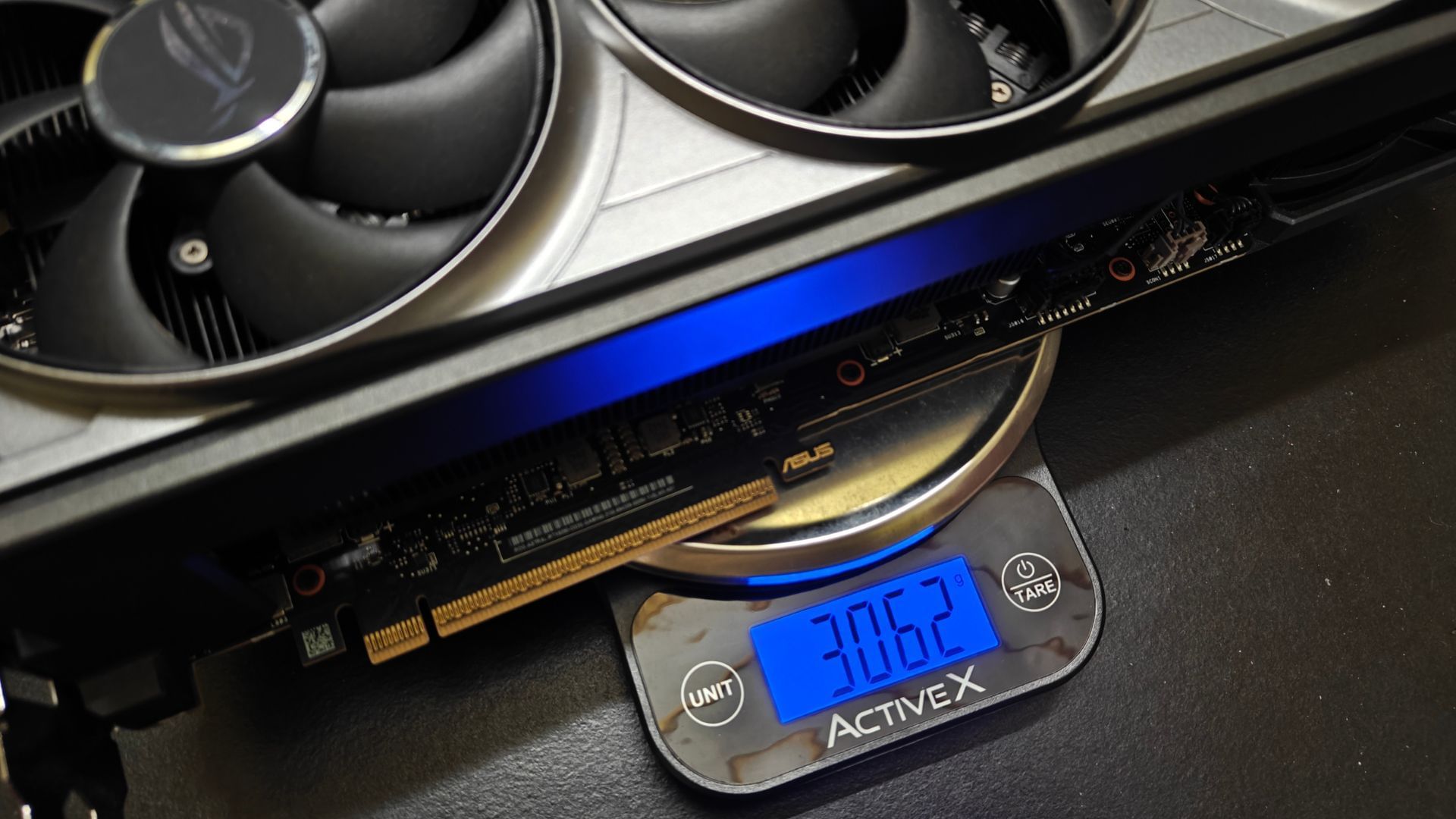 The ROG Astral OC card weighs a whopping 3.06 kg (Image via Sportskeeda)