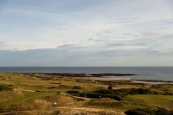 Who is leading the Alfred Dunhill Links Championship 2025 after round 2 was suspended? Leaderboard explored