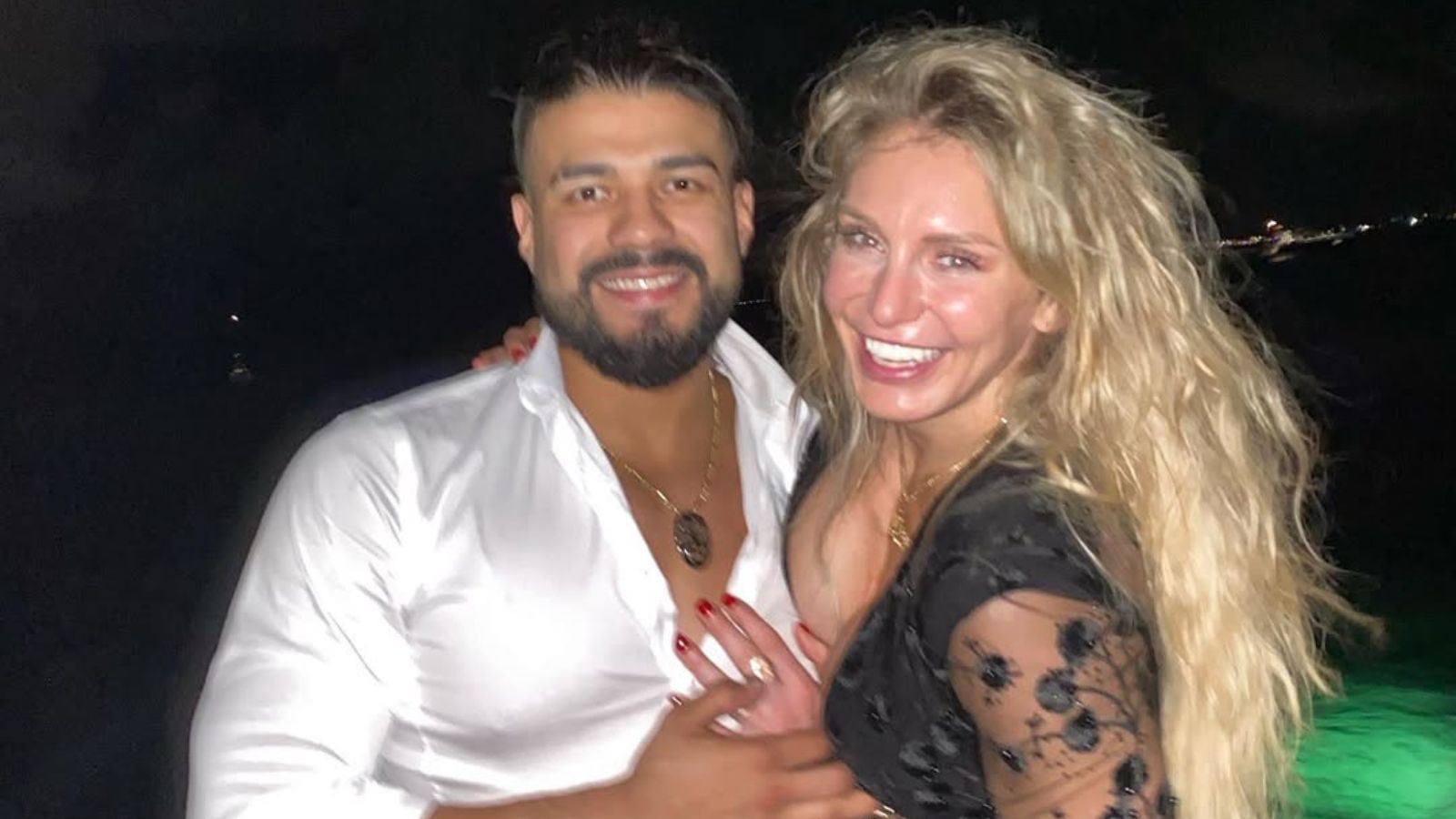Andrade and Charlotte Flair