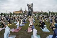 Pilates Exercises At Sanam Luang (Image via Getty)