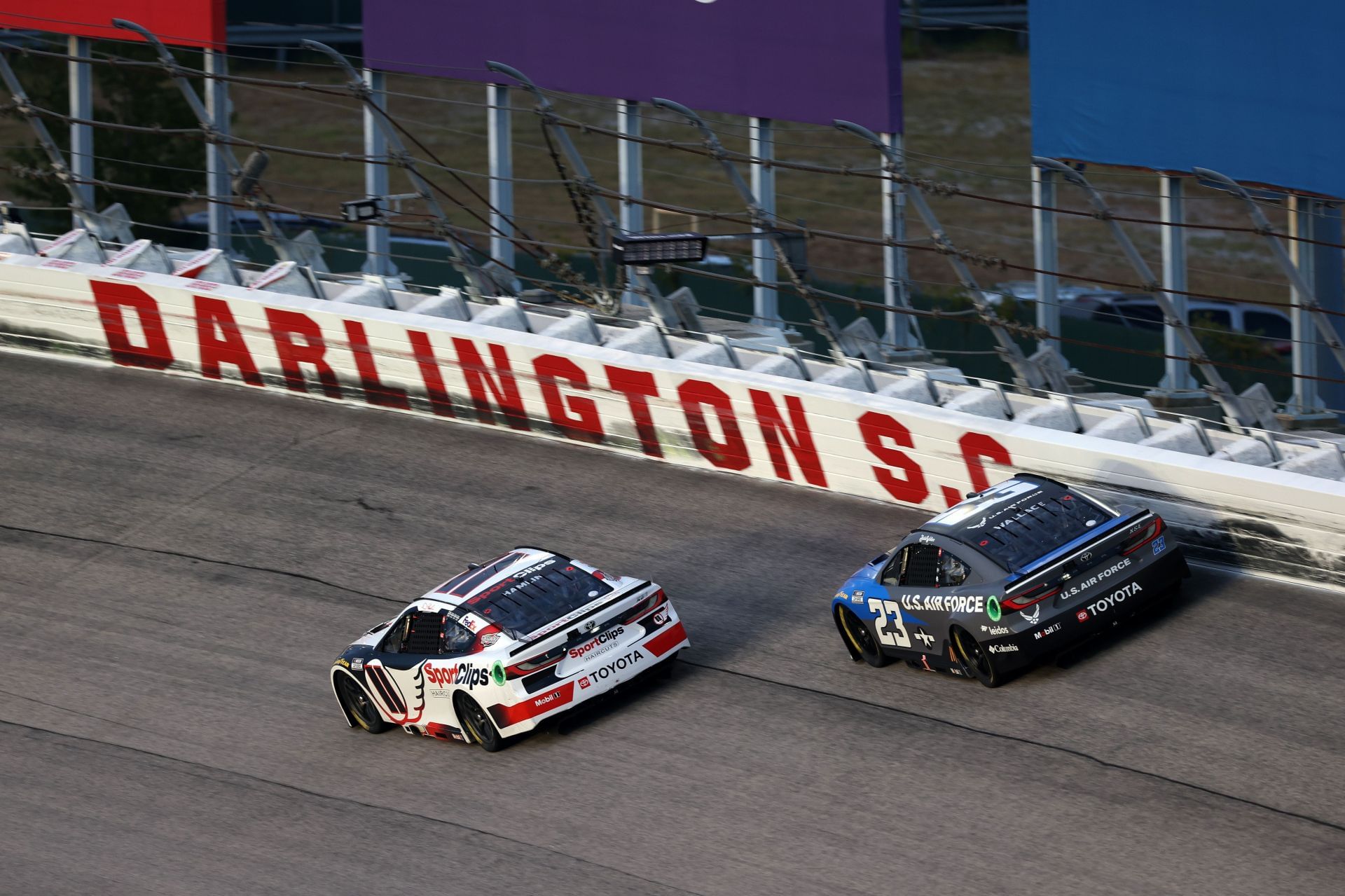 Denny Hamlin (11) and Bubba Wallace (23) during the NASCAR Cup Series Cook Out Southern 500. Source: Getty