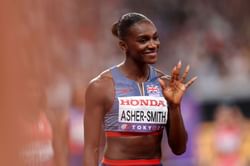 Olympian Dina Asher-Smith poses in green bikini during vacation at Cayman Islands amid track off-season