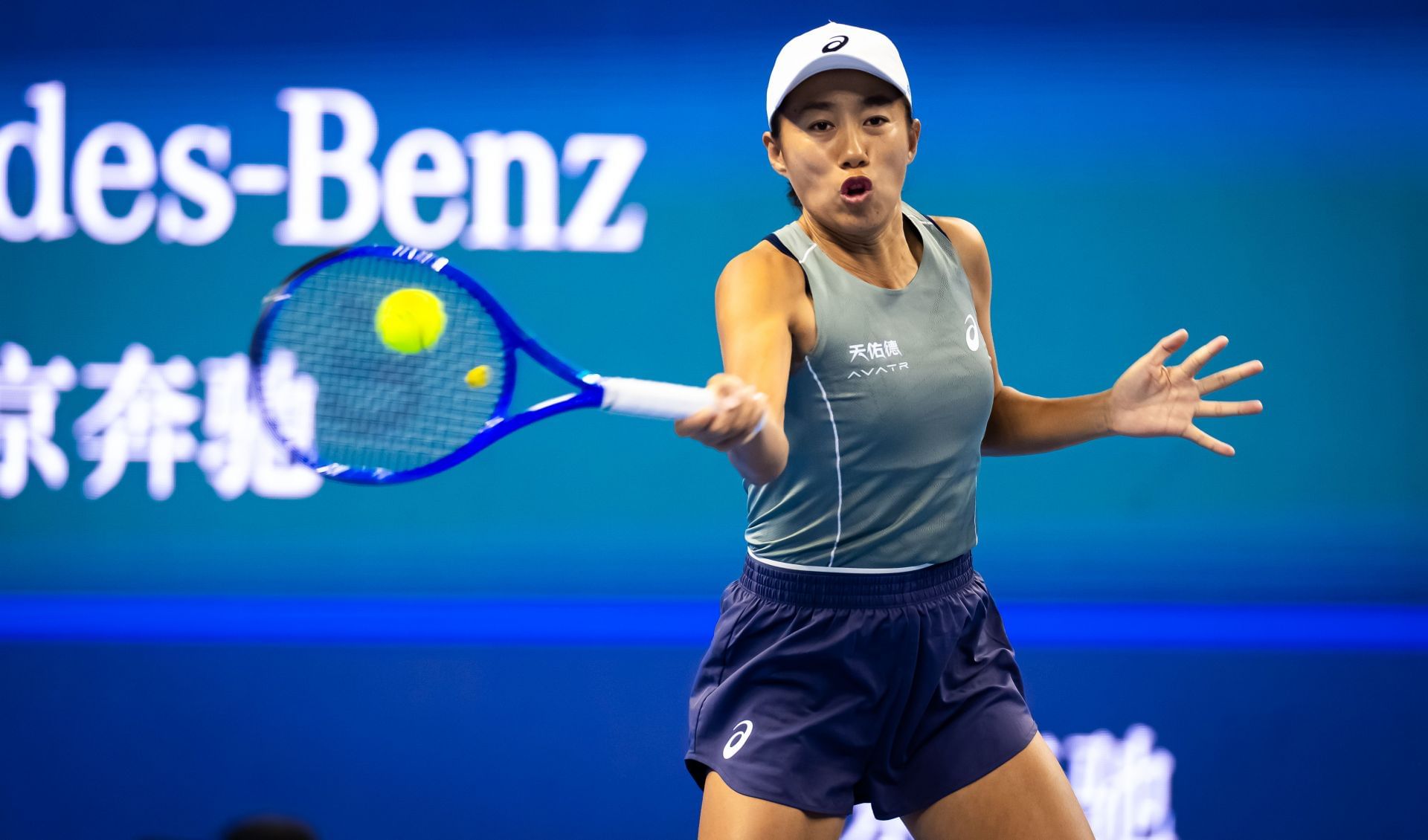 Zhang Shuai hits a forehand | Image Source: Getty