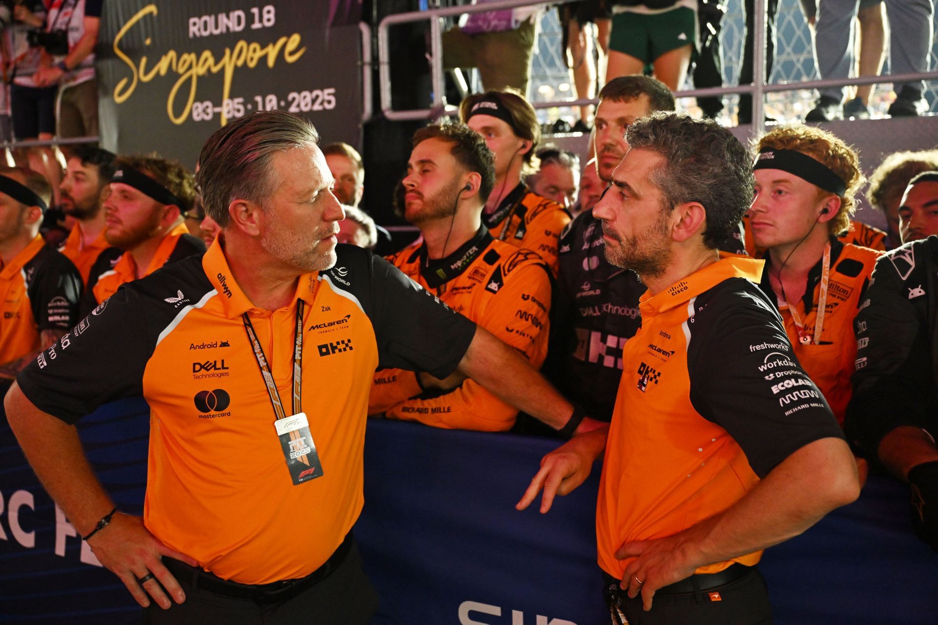Zak Brown (L) and Andrea Stella (R) after the 2025 F1 Grand Prix of Singapore - Source: Getty