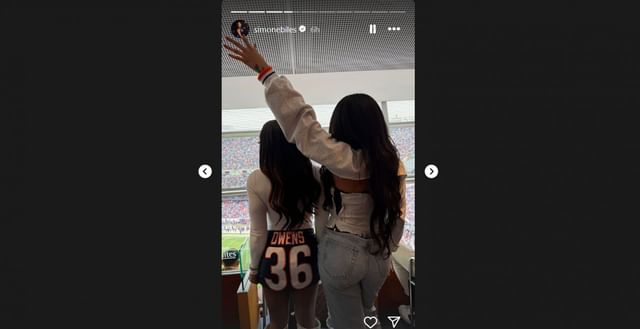 Simone Biles in custom Bears skirt and Cowboys boots during Saints game