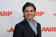 John Stamos at AARP's annual Movies For Grownups Awards (Image via Getty)