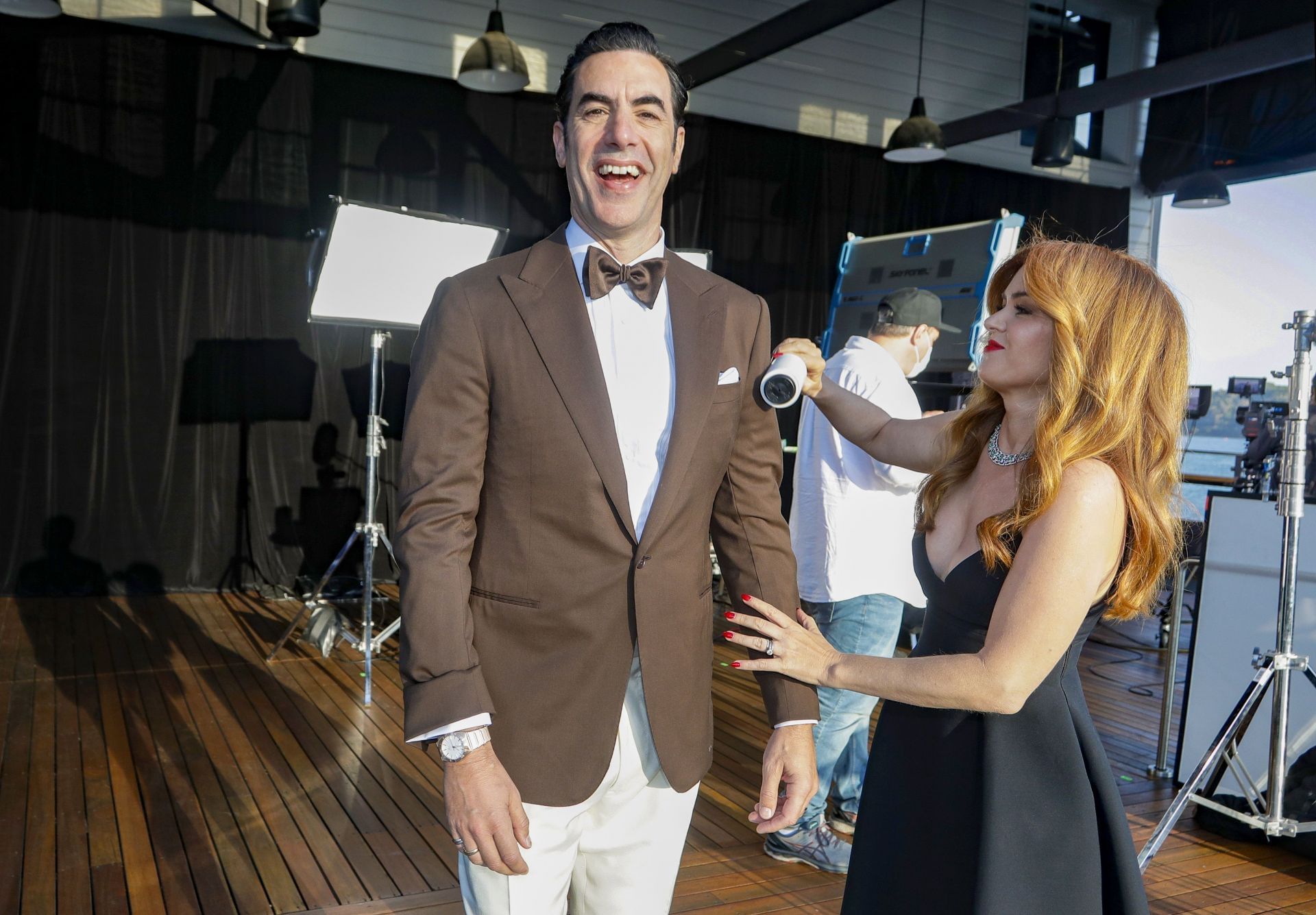 Sacha Baron Cohen (L) and Isla Fisher attend a screening of the Oscars on Monday, April 26, 2021 in Sydney, Australia. (Image via Getty)