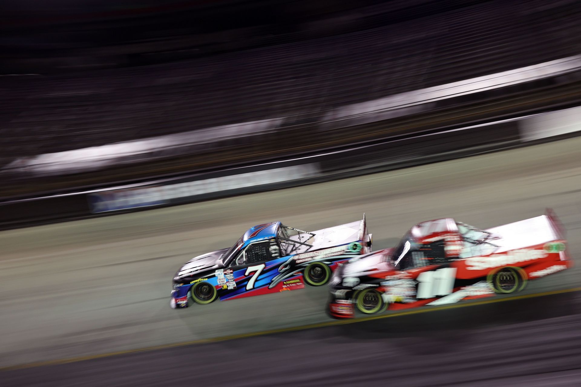 Connor Zilisch (7) and Corey Heim (11) during the 2024 NASCAR Truck Series race. Source: Getty