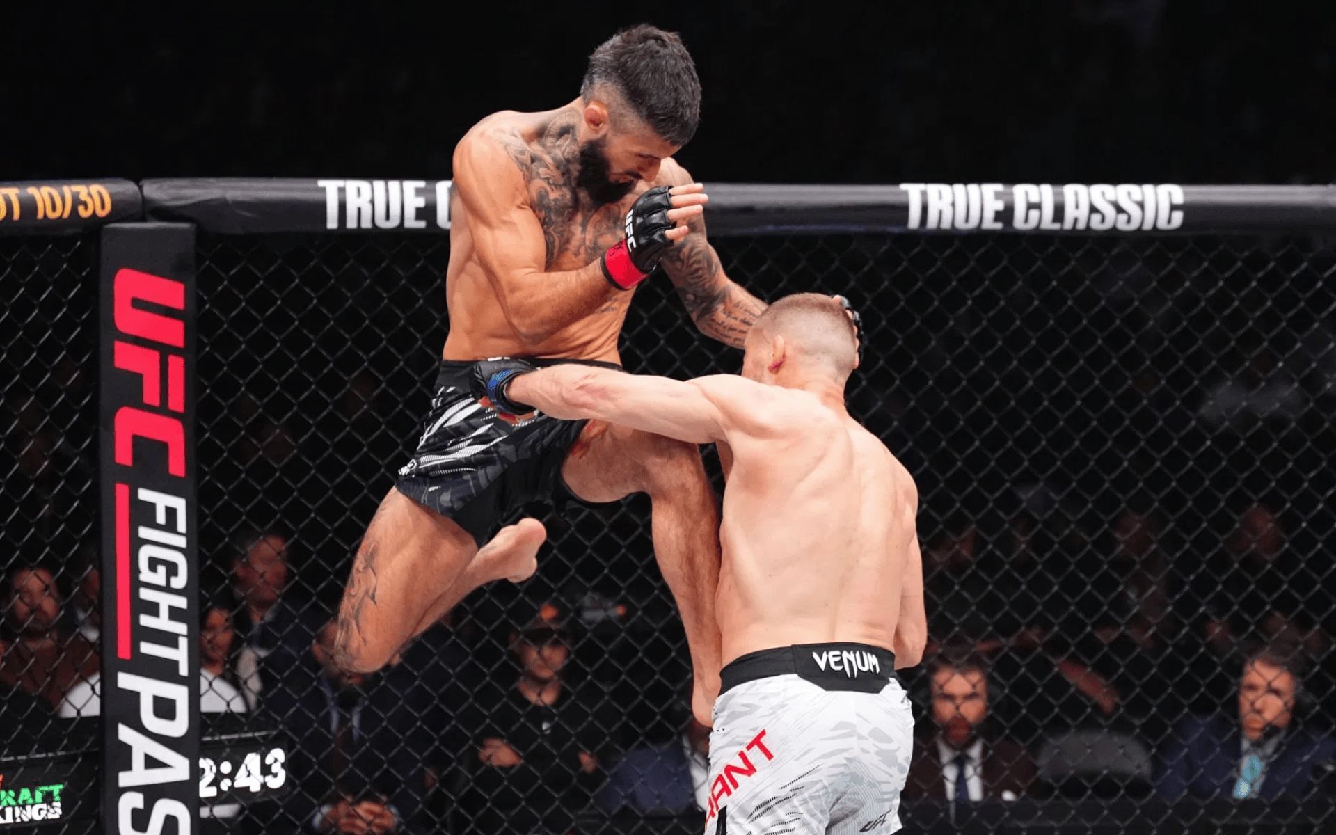 Charles Jourdain (pictured) landing a flying knee at UFC Vancouver. [Image courtesy: Getty]