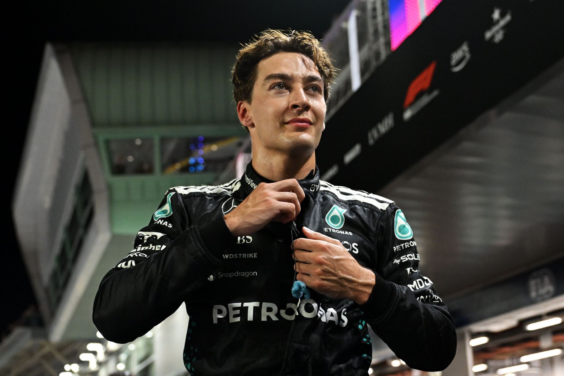 Pole position qualifier George Russell of Great Britain and Mercedes AMG Petronas F1 Team looks on in parc ferme during qualifying ahead of the F1 Grand Prix of Singapore - Source: Getty Images