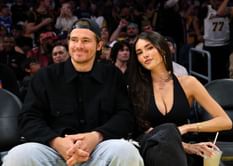 WATCH: Madison Beer brings out Justin Herbert's unseen character at Lakers game while leaving fans "obsessed" with her all-black leather outfit