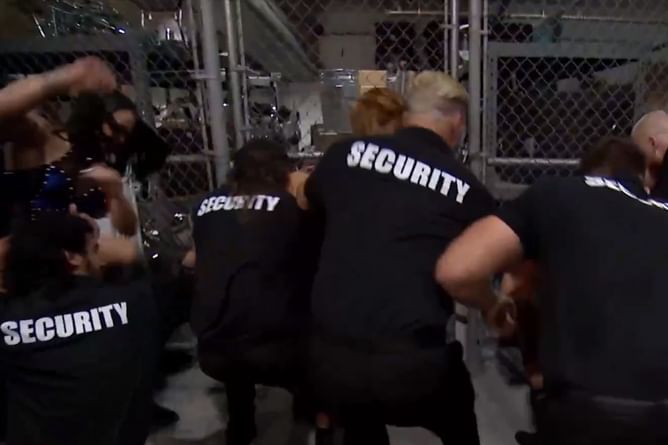 Security officials drag away AEW stars after shocking backstage brawl on Collision
