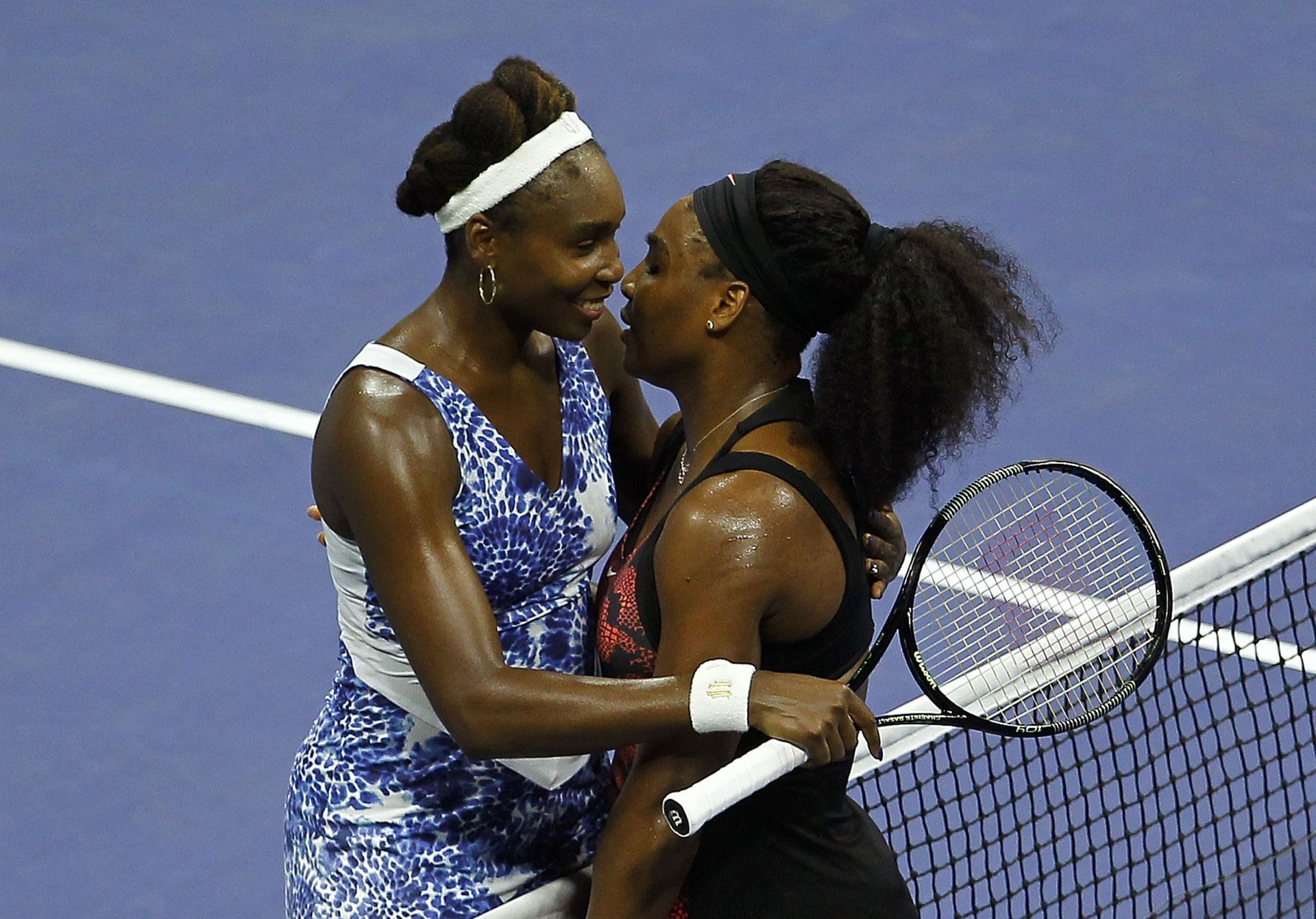 Serena Williams embraces Venus Williams - Source: Getty