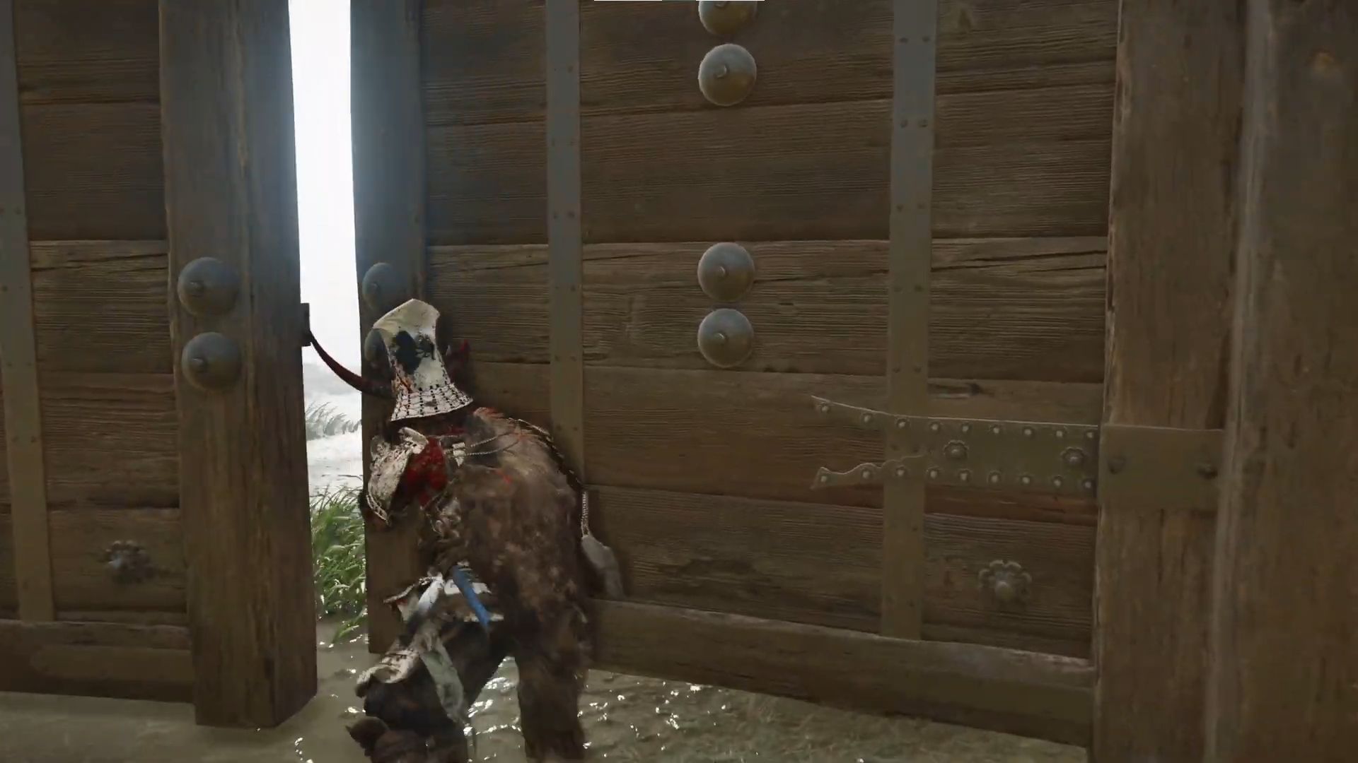 Push through the gate in the Echoes of the Storm quest (Image via Sportskeeda Gaming || Sucker Punch)