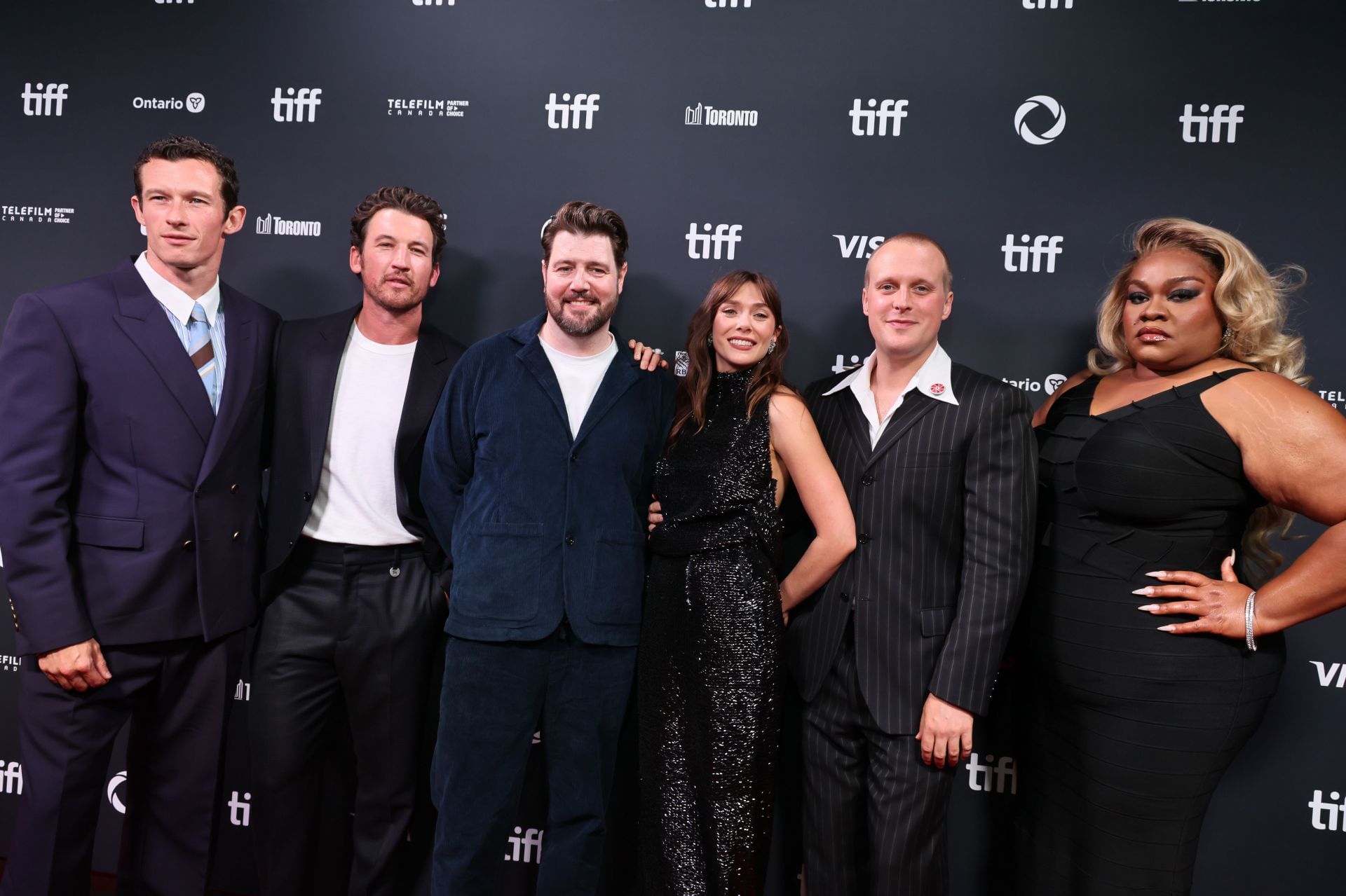 Callum Turner, Miles Teller, David Freyne, Elizabeth Olsen, John Early, and Da&#039;Vine Joy Randolph attend the premiere of &quot;Eternity&quot; during the 2025 Toronto International Film Festival  (Image via Getty)