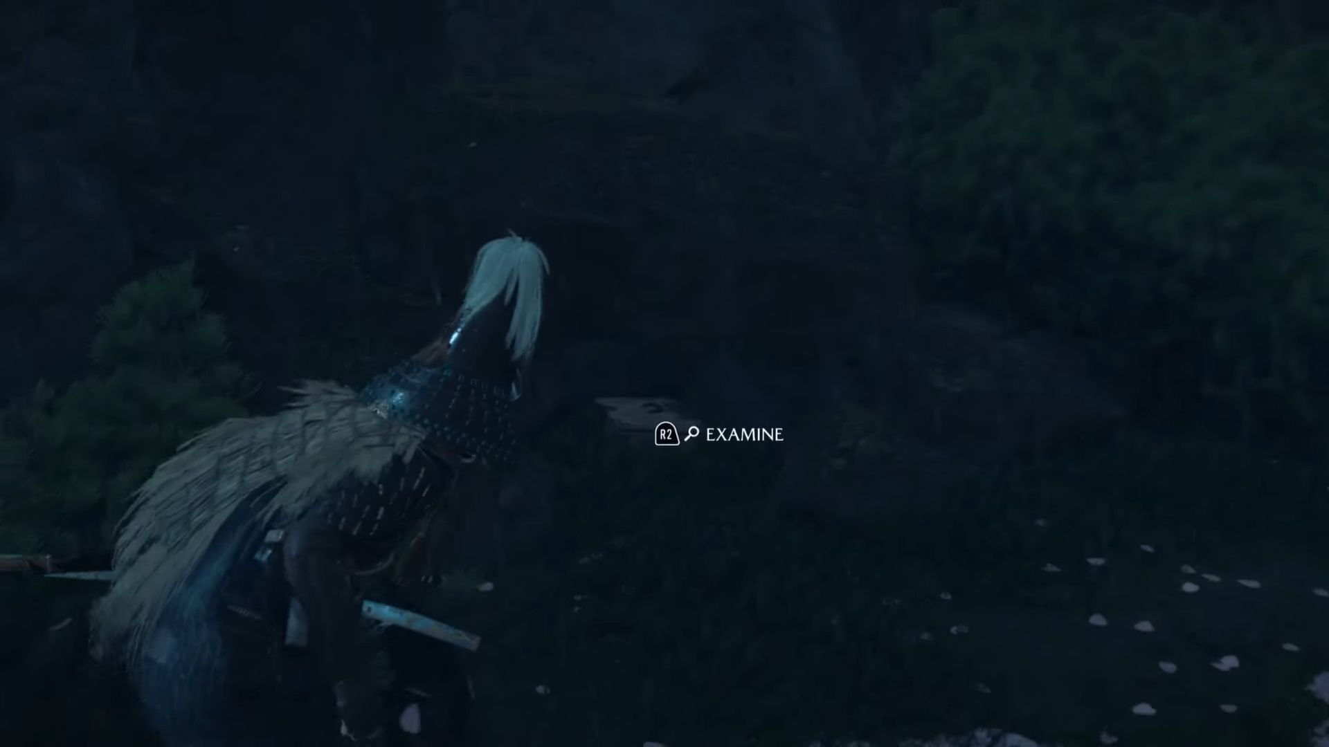 Find the treasure on the side of a cliff (Image via Sucker Punch || YouTube/@GamingFightClub)