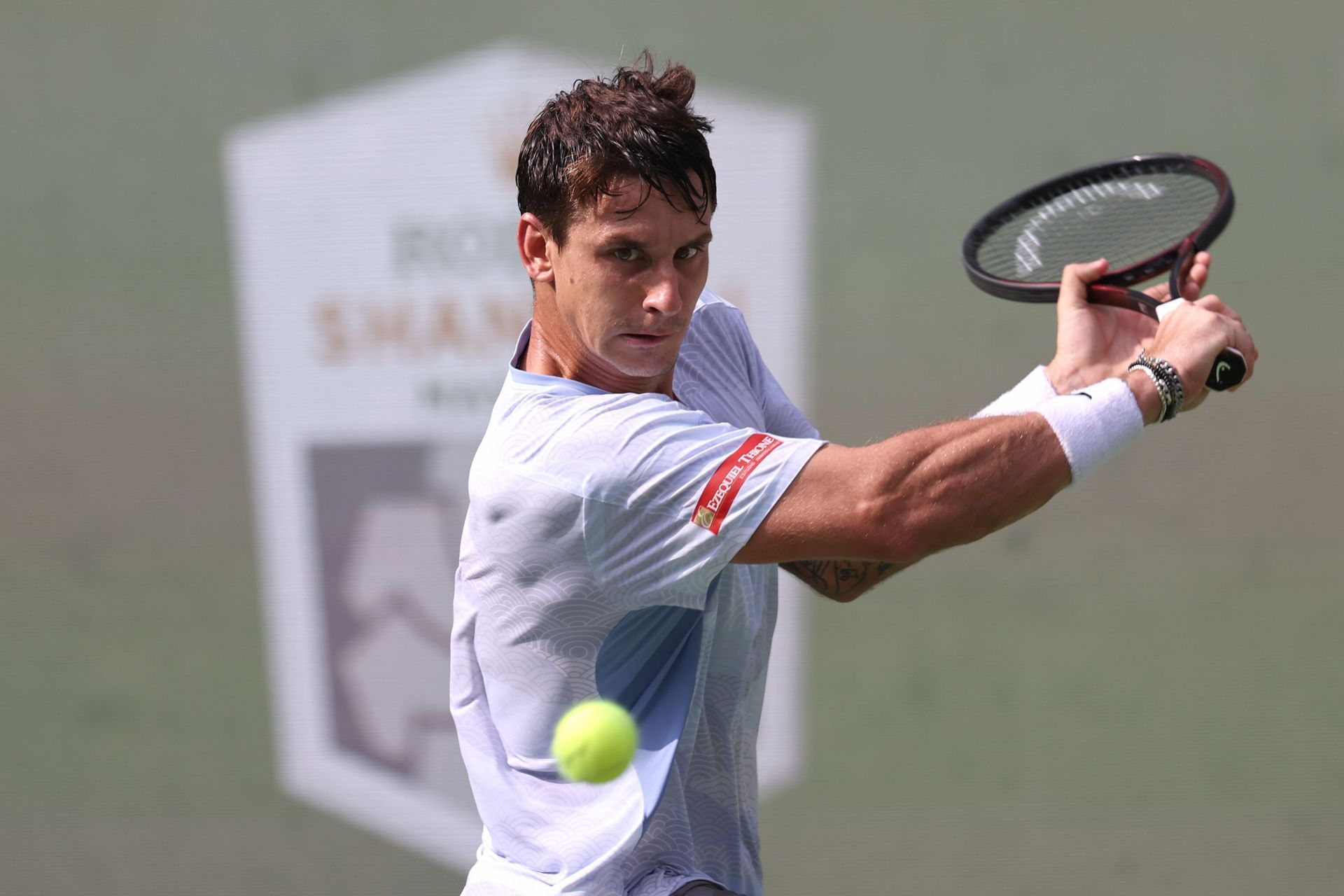 Ugo Carabelli retrieves a ball in Shanghai | Image Source: Getty