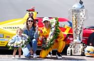 Alex Palou poses with his wife and daughter after winning the 109th Indianapolis 500 - Source: Getty
