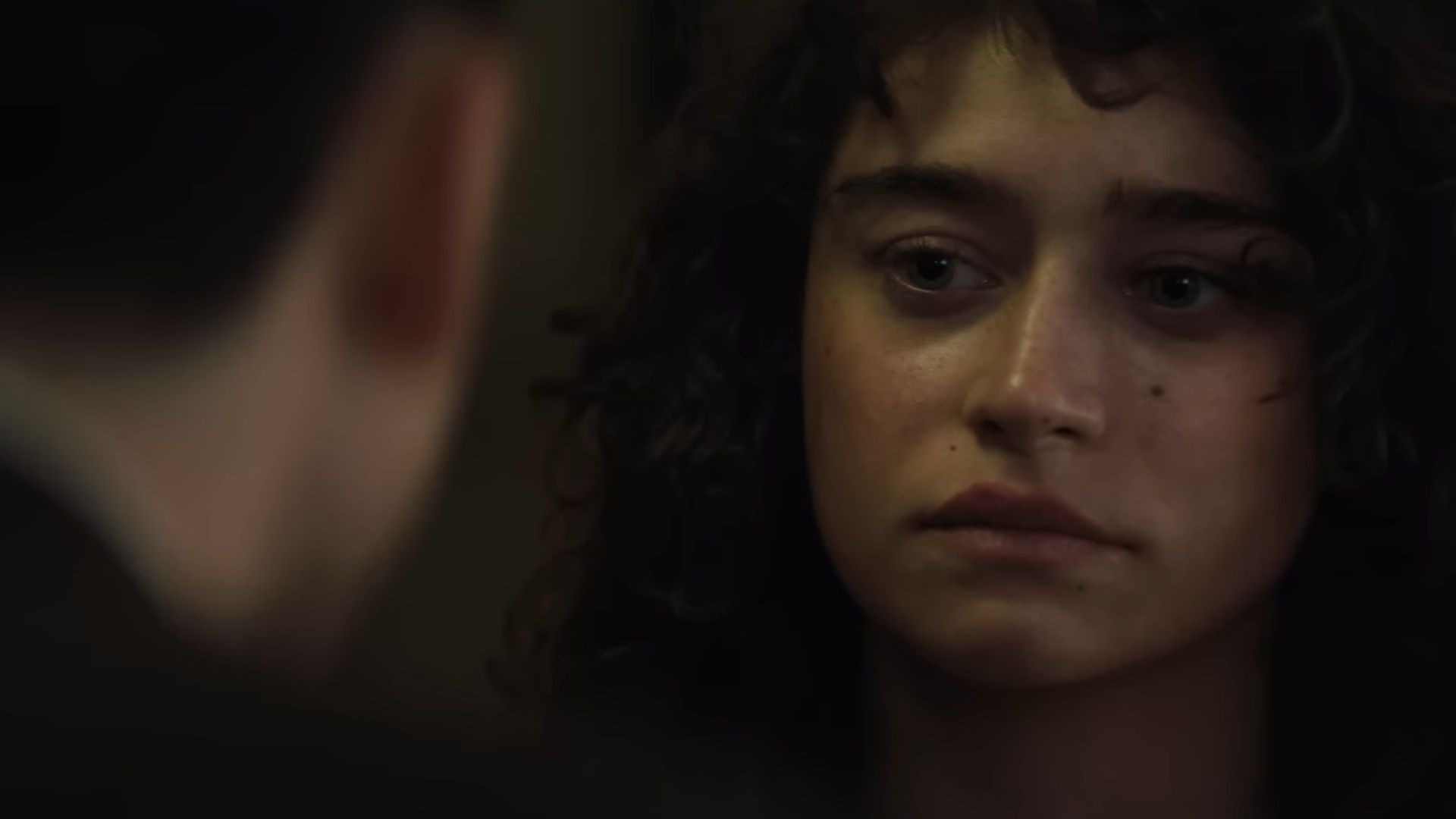 Marty Supreme still: an intense close-up during a private scene between two characters. (Image via A24)