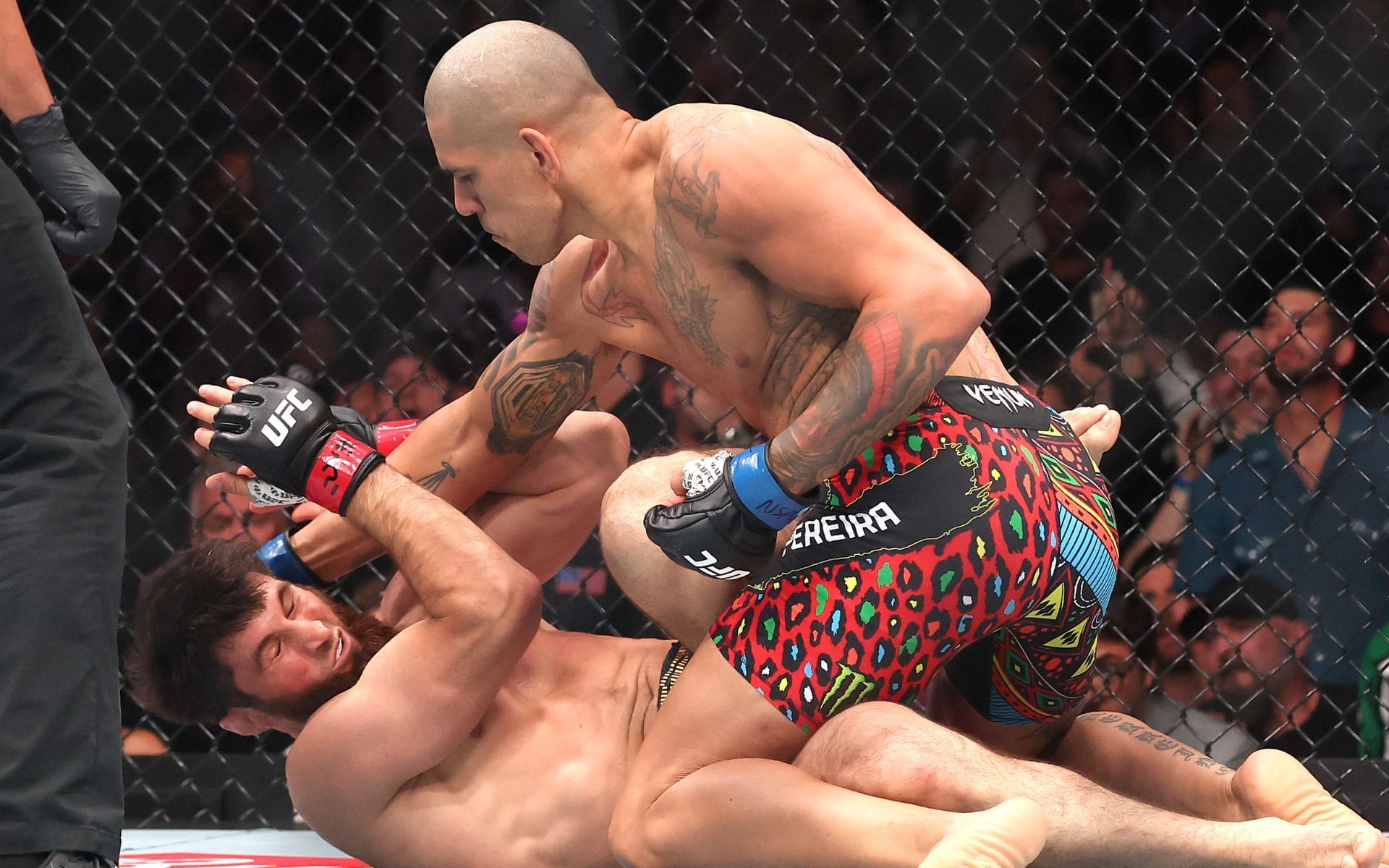Alex Pereira (top) in action during his knockout win over Magomed Ankalaev (right) at UFC 320. [Images courtesy: Getty Images]