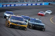 Corey Heim (26) and Riley Herbst (98) during the 2024 Xfinity Series race at Phoenix. Source: Getty