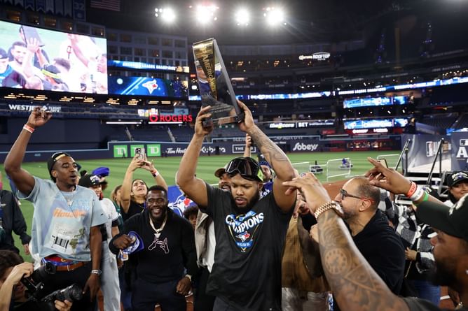 "George Springer was more deserving"; "Adorable girl dad stuff" - Fans divided as Vladimir Guerrero Jr. shares priceless ALCS MVP moment with daughter