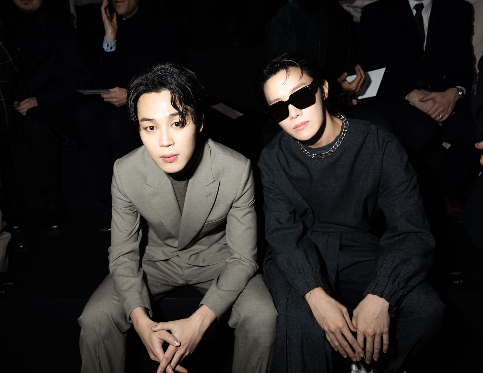Jimin and J-Hope attend the Dior Homme Menswear Fall-Winter 2023-2024 show as part of Paris Fashion Week on January 20, 2023, in Paris, France. (Photo by Victor Boyko/Getty Images)
