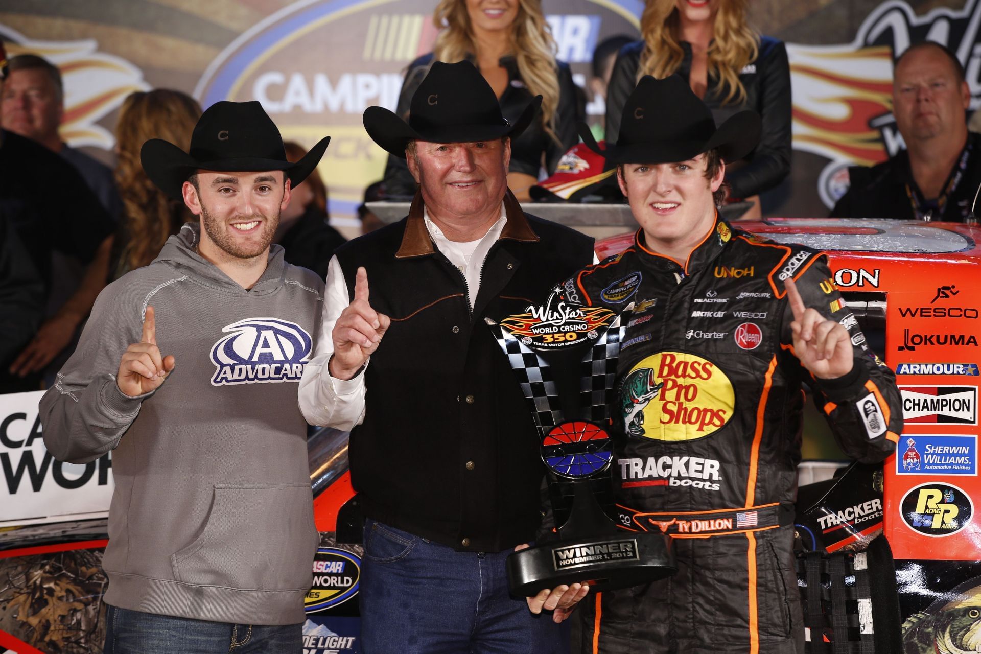 (L-R) Austin Dillon, Richard Childress, and Ty Dillon at Texas on November 1, 2013. Source: Getty