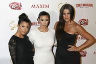 Kourtney Kardashian, Kim Kardashian and Khloe Kardashian at Maxim's 10th Annual Hot 100 Celebration (Image via Getty)