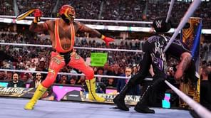 Rey Mysterio reacts as Dominik Mysterio causes Judgment Day to lose their titles