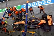Oscar Piastri entering the pitbox in the McLaren MCL39 at the second free practice session during the 2025 F1 Grand Prix of Singapore - Source: Getty