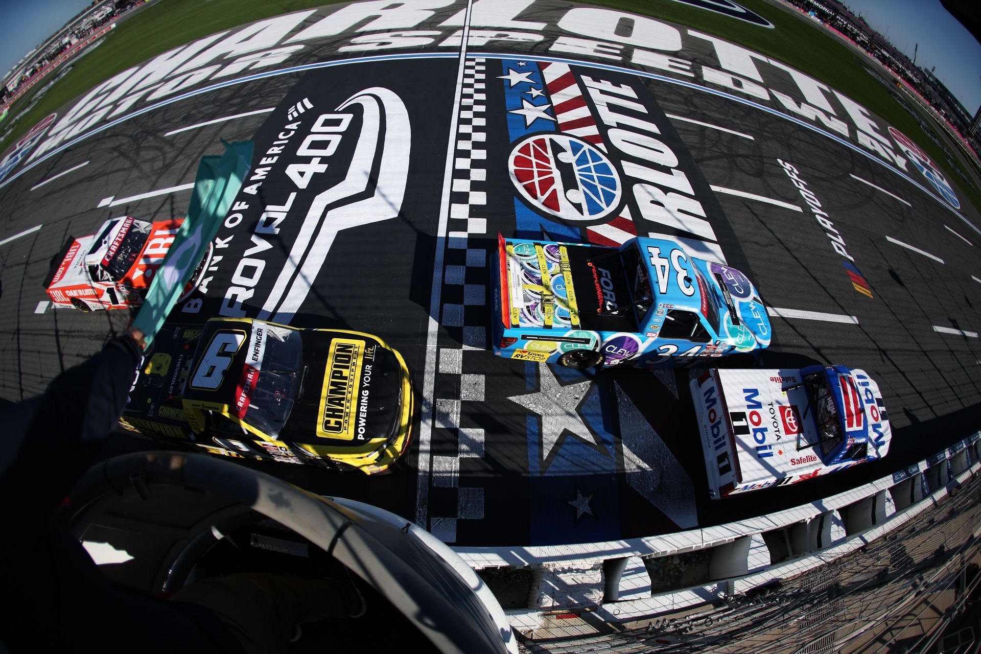 Corey Heim (11) leads Connor Zilisch in the NASCAR Truck Series EcoSave 250. Source: Getty