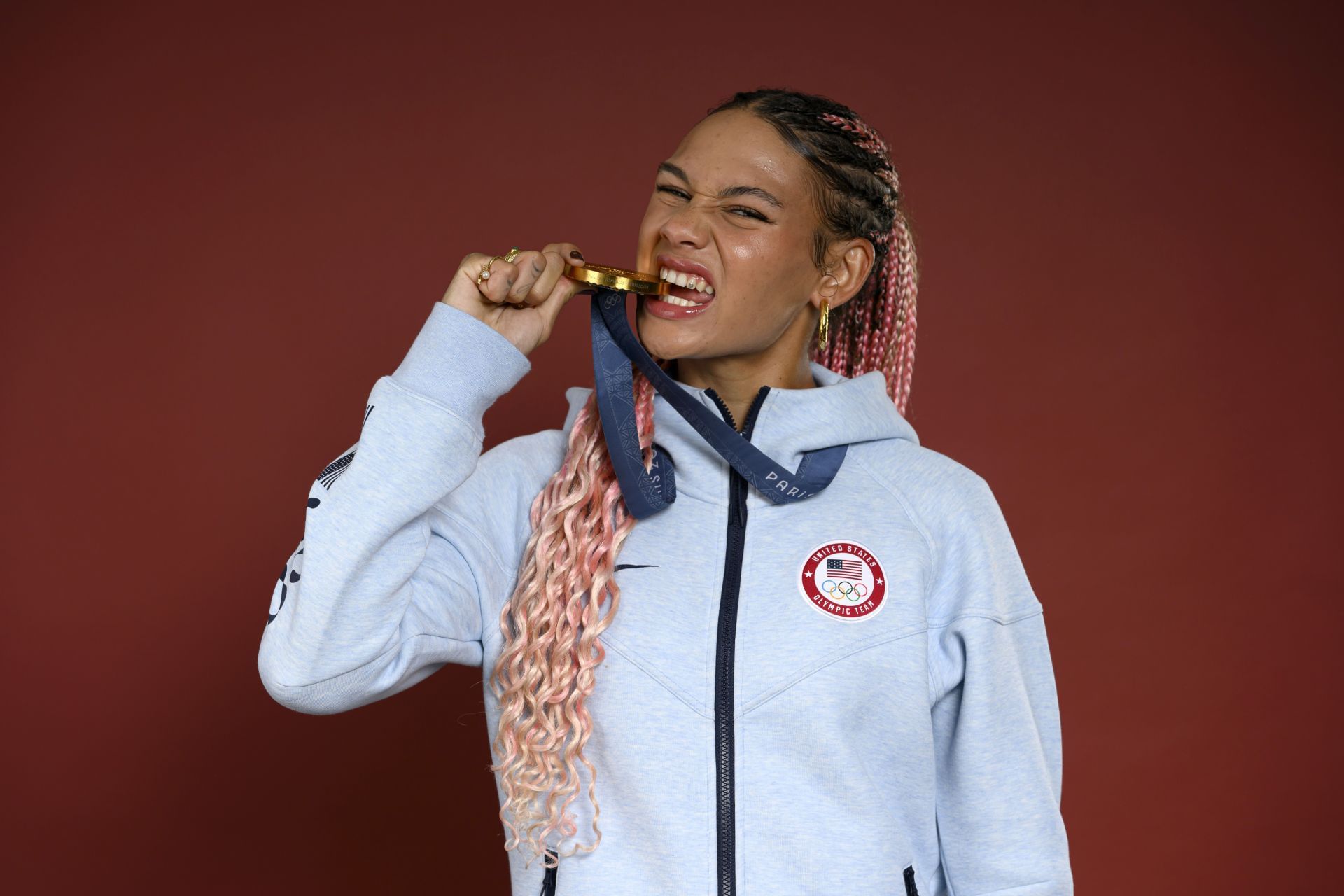 Rodman poses with her gold medal at Paris 2024 - Source: Getty
