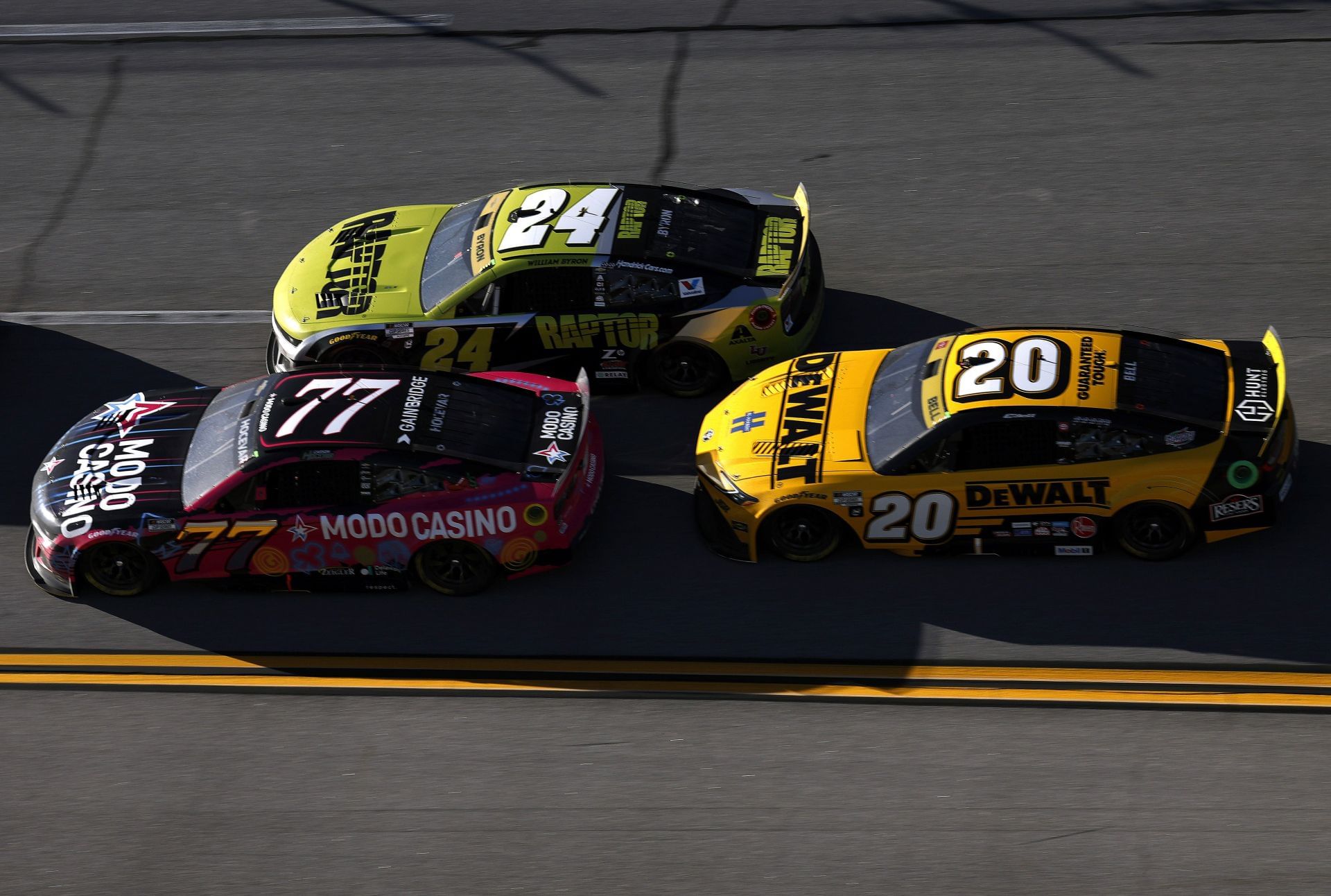 William Byron (24), Carson Hocevar (77), and Christopher Bell (20) at Talladega Superspeedway. (Getty)