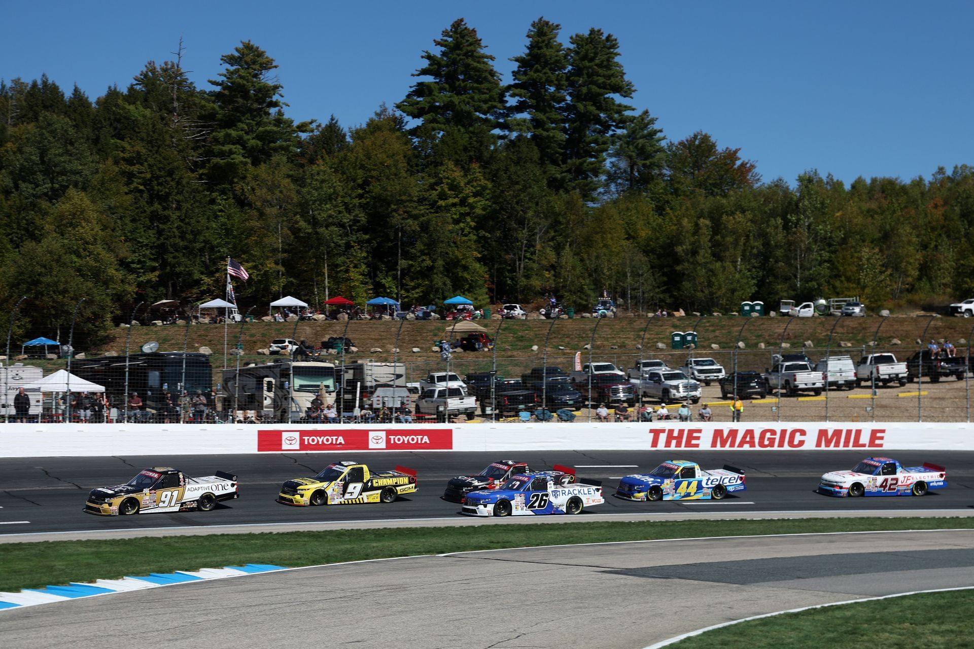 Jack Wood (91) and Grant Enfinger (9) lead the Truck Series race at NHMS. Source: Getty