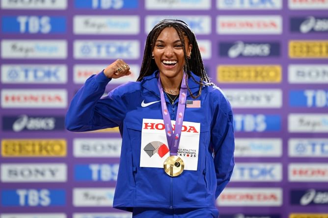 Tara Davis-Woodhall turns up the glamour in Times Square in a glittery dress ahead of Alexis Ohanian’s Athlos feature