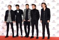 Niall Horan, Zayn Malik, Liam Payne, Louis Tomlinson, and Harry Styles of One Direction attend the BBC Music Awards at Earl's Court Exhibition Centre on December 11, 2014, in London, England. (Image via Getty)