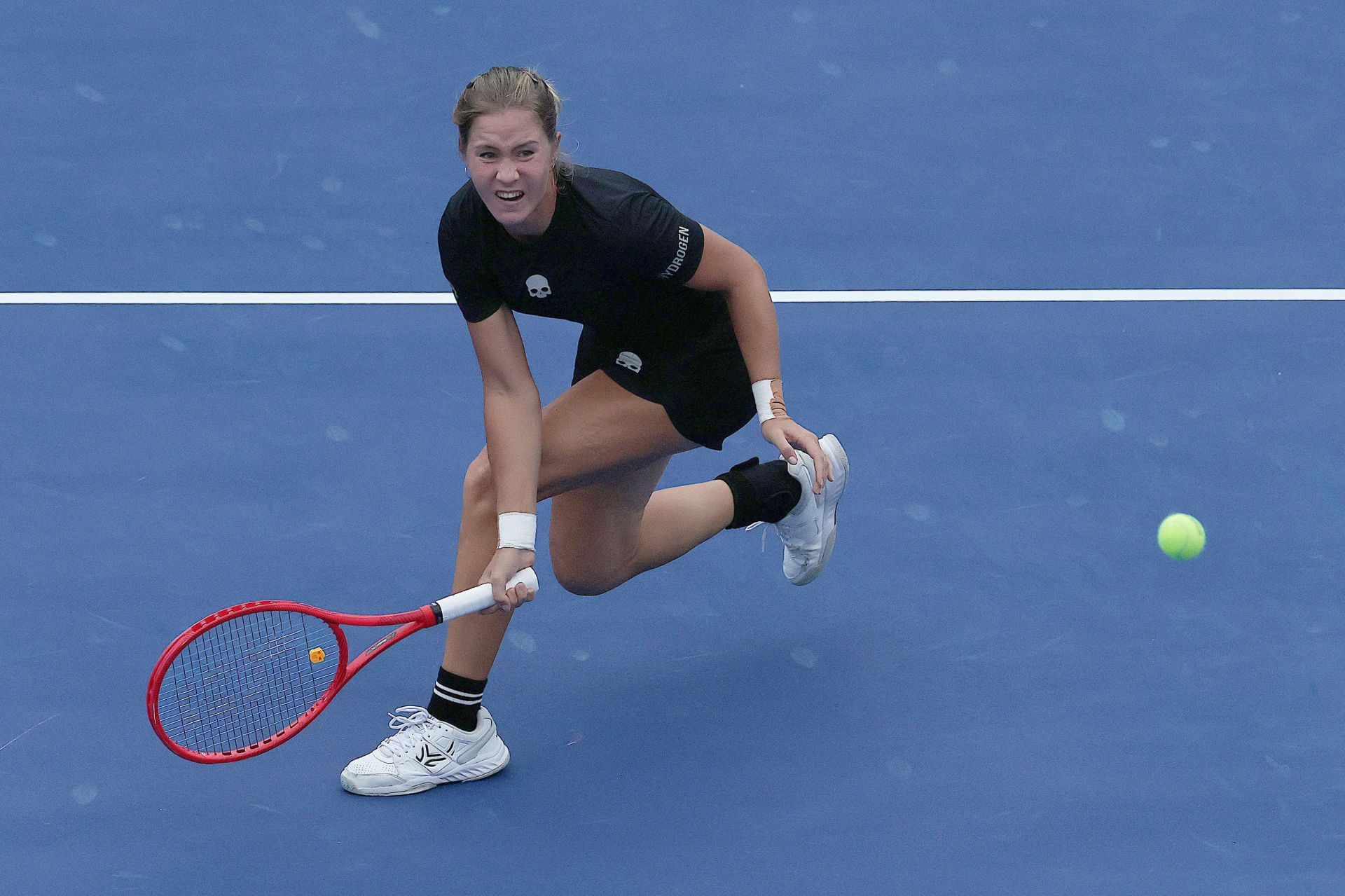 Anastasia Zakharova hits a volley | Image Source: Getty