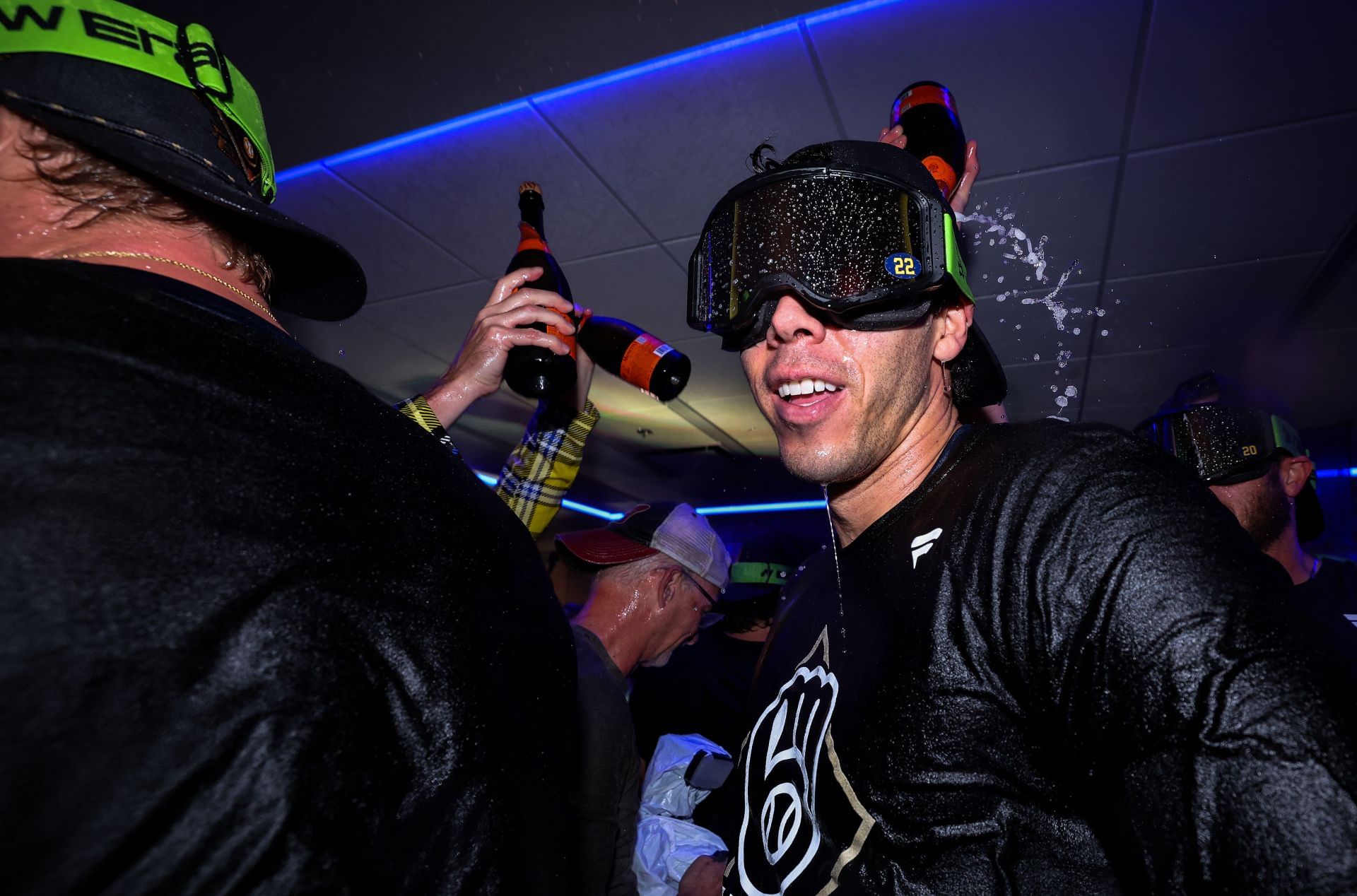 Christian Yelich celebrating in the clubhouse after the Milwaukee Brewers qualified for the NLCS - Source: Getty